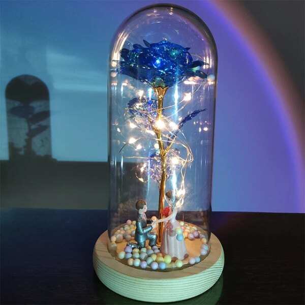 Fleur en feuille d'or 24 carats avec guirlandes lumineuses dégradées