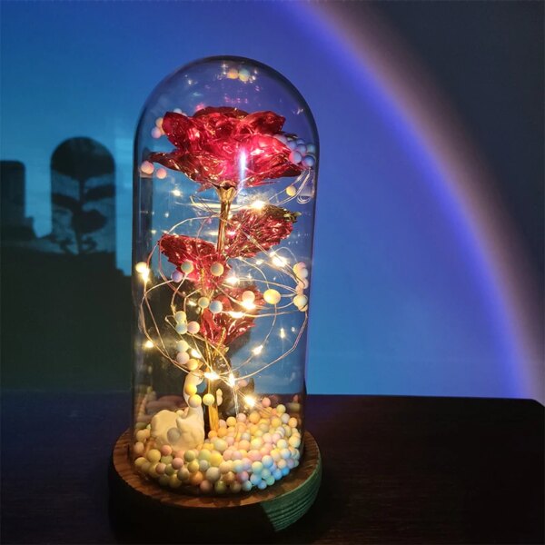 Fleur en feuille d'or 24 carats avec guirlandes lumineuses dégradées