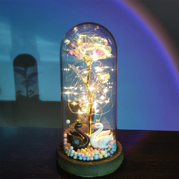 Fleur en feuille d'or 24 carats avec guirlandes lumineuses dégradées