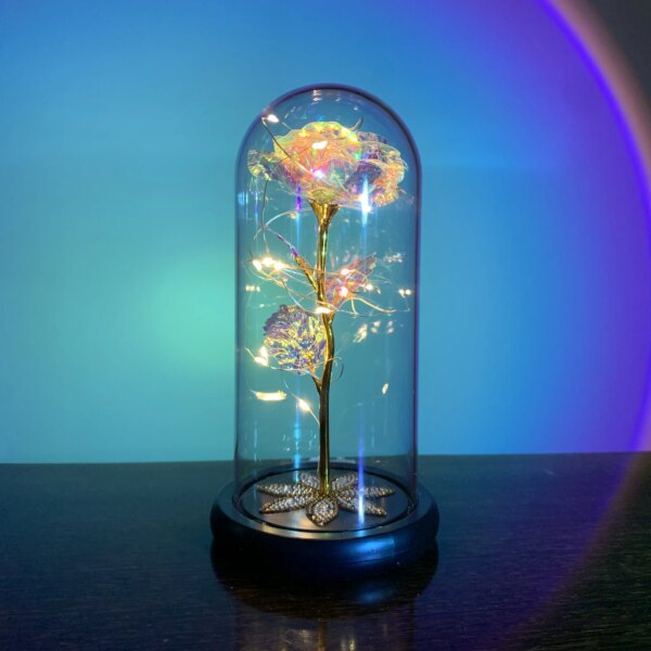 Fleur en feuille d'or 24 carats avec guirlandes lumineuses dégradées