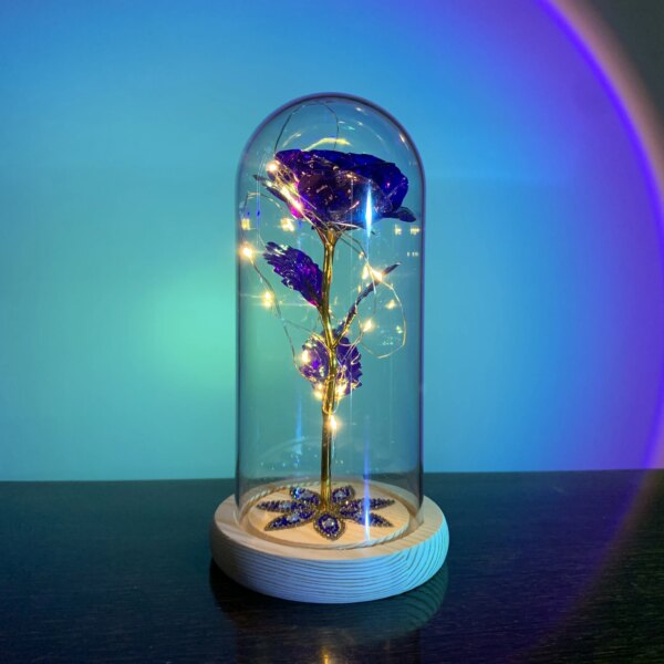 Fleur en feuille d'or 24 carats avec guirlandes lumineuses dégradées