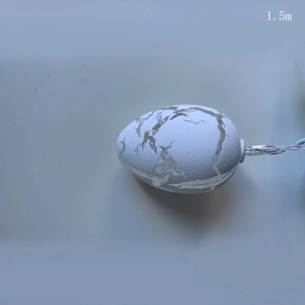 8390-54a3de.jpg Guirlande lumineuse avec 10 œufs Led colorés, 1.5m,